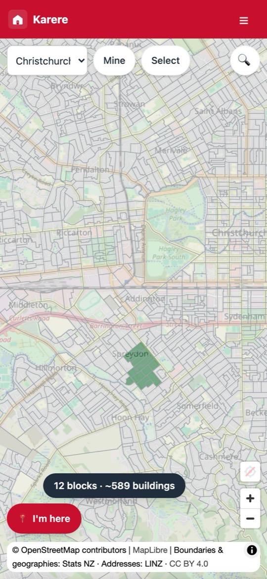 The phone map zoomed out across a city, showing finished blocks in green spreading across several suburbs.